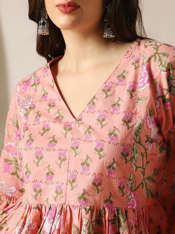 Peach Floral Print Panelled Peplum Tunic with V-Neck & Bell Sleeves – Elegant Fusion Wear for Women