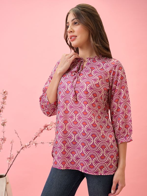 Pink Ethnic Print Workwear Tunic with Frilled Tie-Up Neck & Curved Hem – Elegant Everyday Fusion Wear for Women